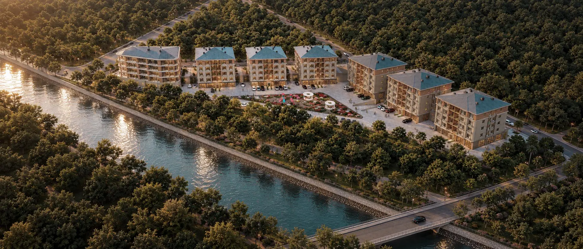 Valora Park Residences, Silivri: gün batımında nehir kenarında, merkezi bir bahçe etrafında konumlanan blokların havadan görünümü